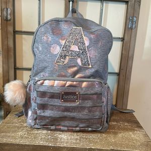 Justice backpack in good used condition